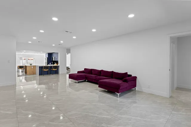 a living room with a couch and a flat screen tv