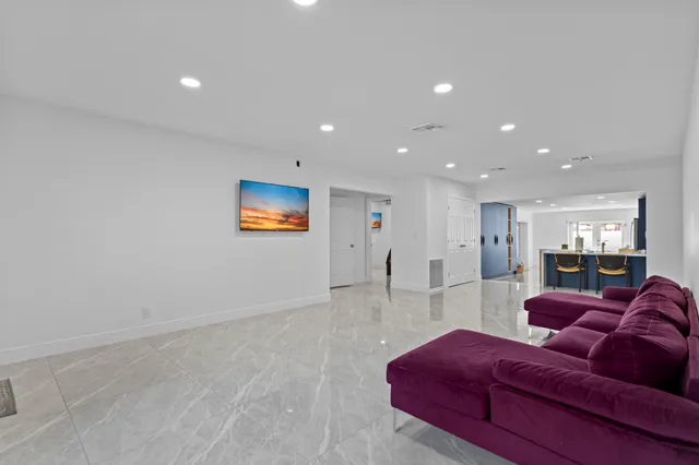 a bedroom with a bed and a walk in closet