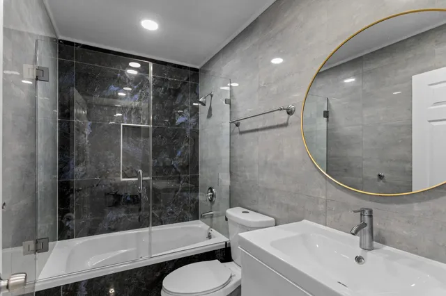 a view of a house with swimming pool and sitting area