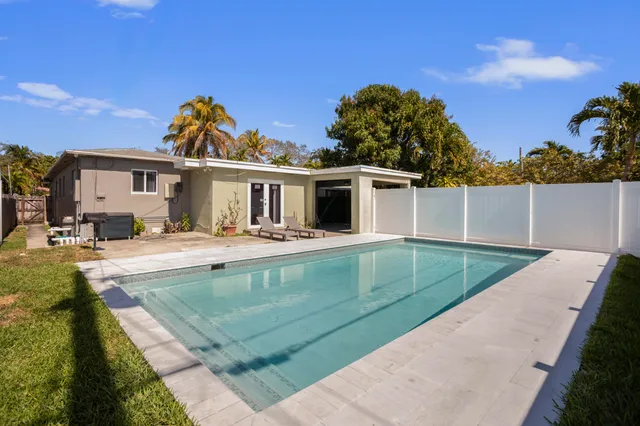 a view of a house with a swimming pool