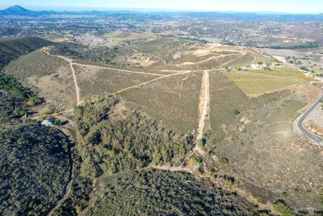 a view of a yard with a mountain