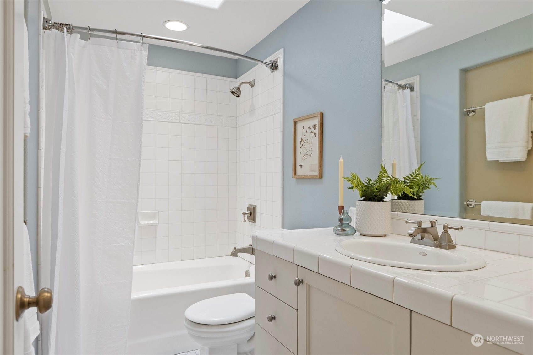289 Briar Road Bellingham, WA 98225 - Photo 18 of 40 a bathroom with a granite countertop sink a toilet and shower