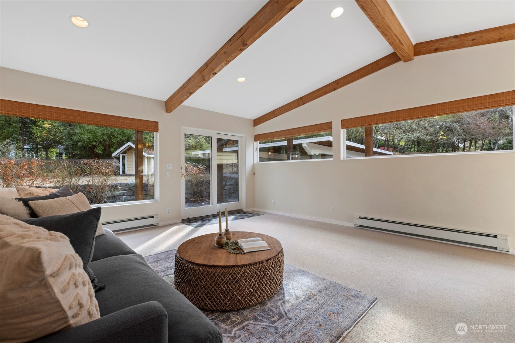289 Briar Road Bellingham, WA 98225 - Photo 22 of 40 a living room with furniture and a floor to ceiling window