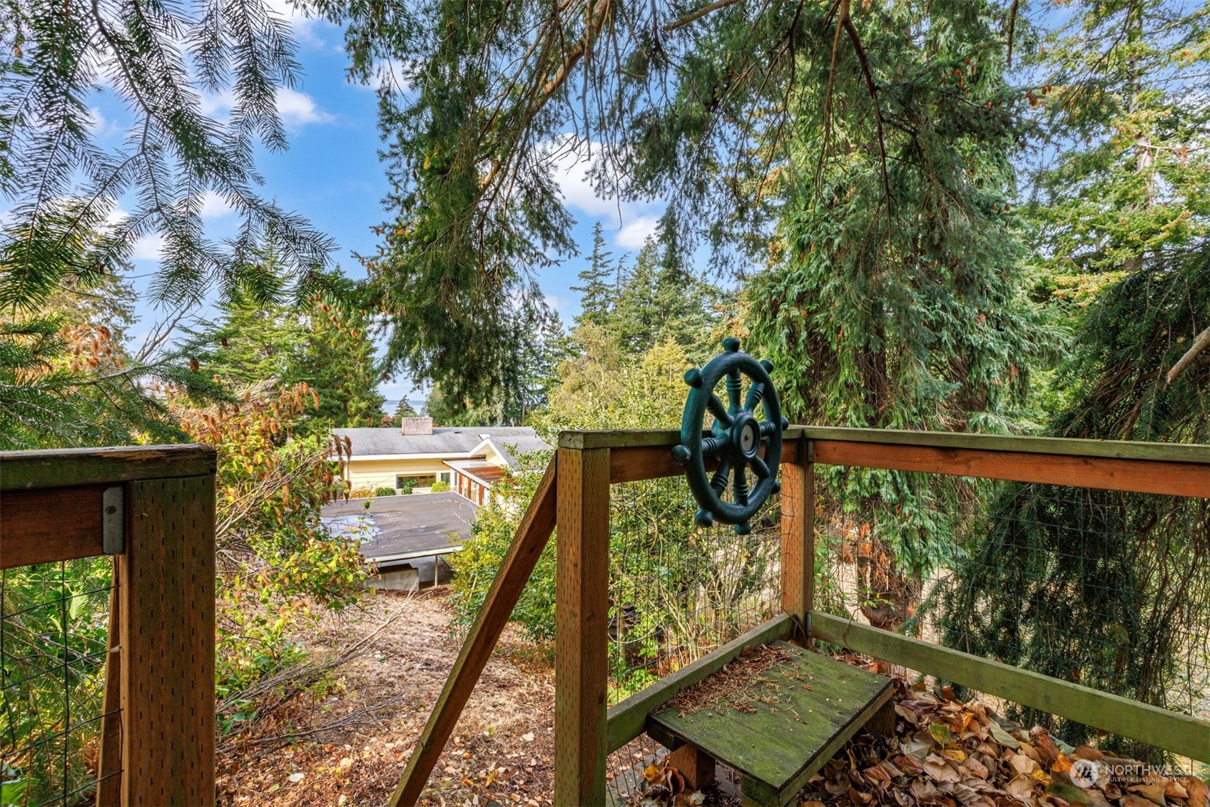289 Briar Road Bellingham, WA 98225 - Photo 39 of 40 a view of a balcony with wooden floor and fence
