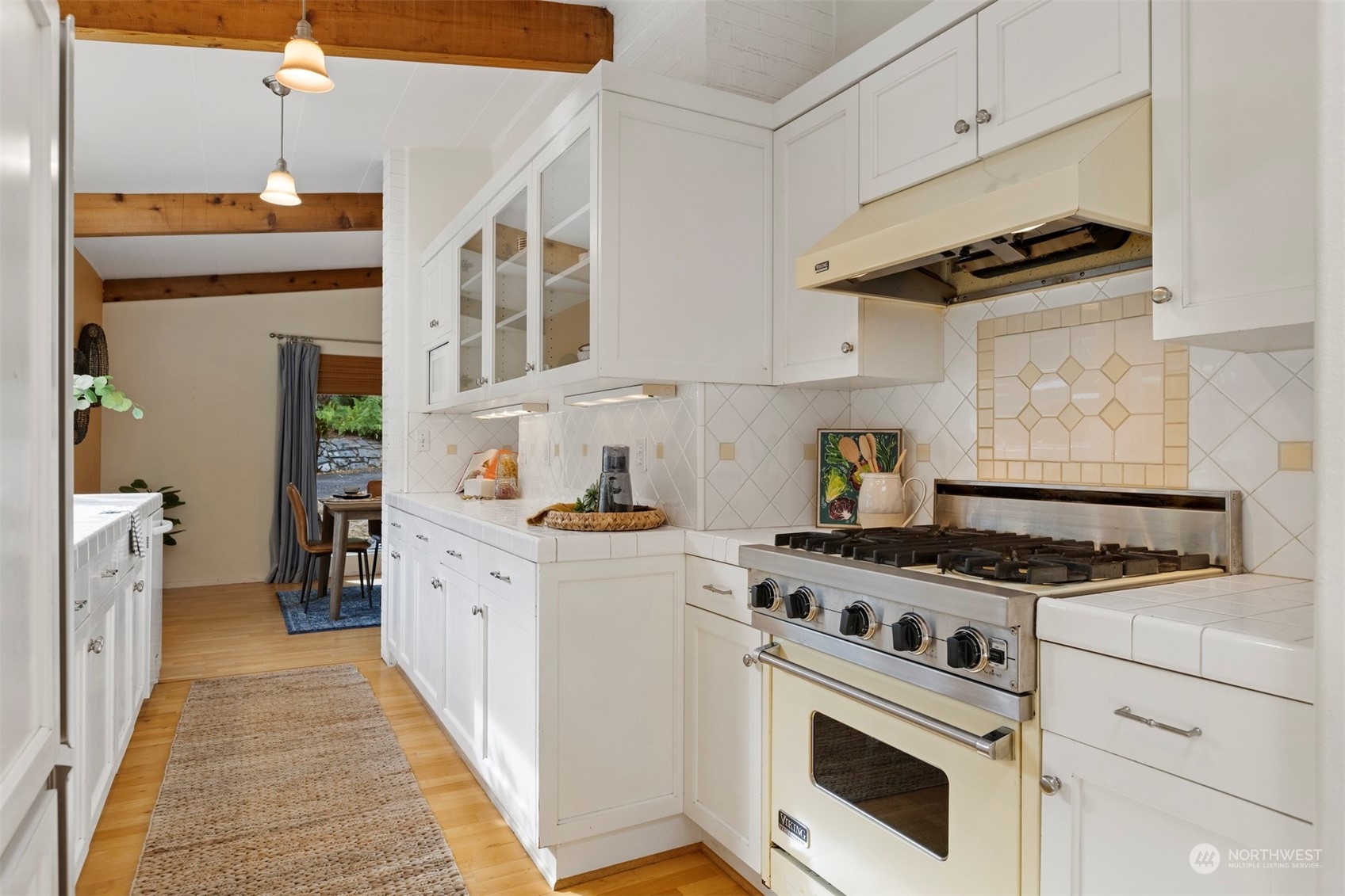 289 Briar Road Bellingham, WA 98225 - Photo 9 of 40 a kitchen with granite countertop cabinets stainless steel appliances and wooden floor