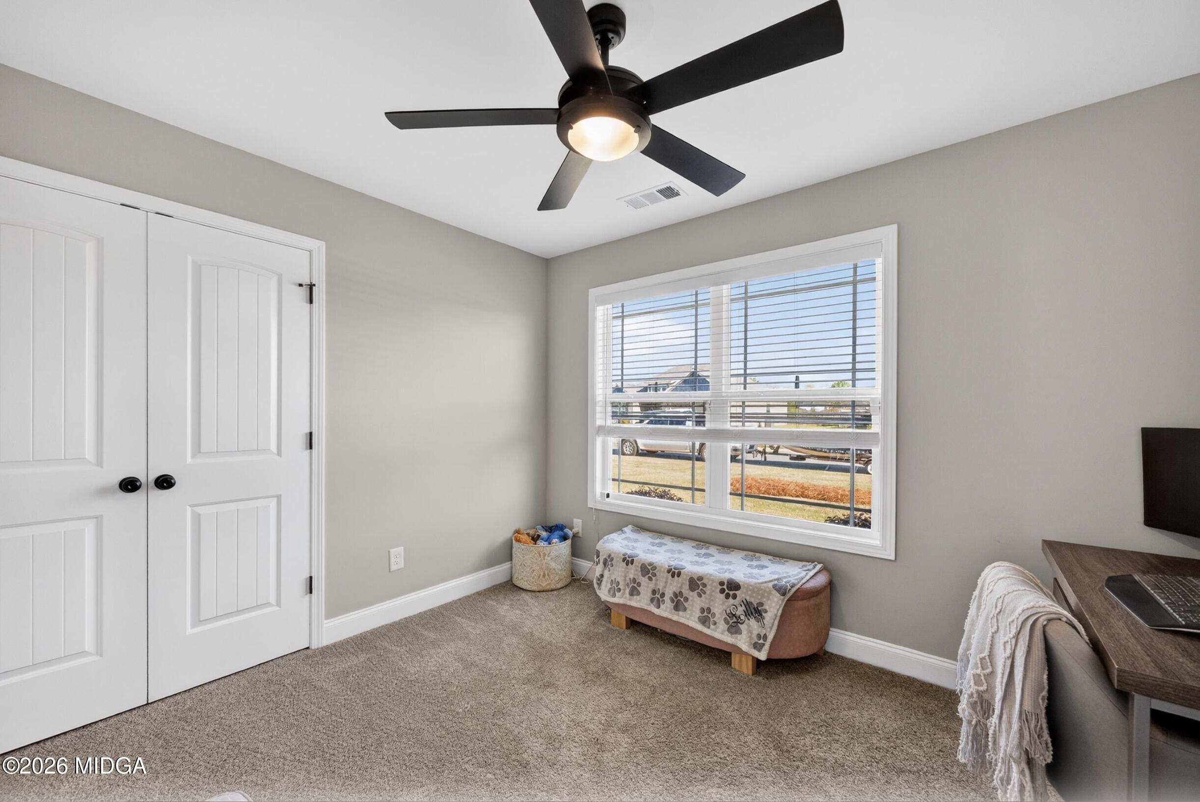 610 Daisy Drive Perry, GA 31069 - Photo 23 of 33 a room with furniture and a window