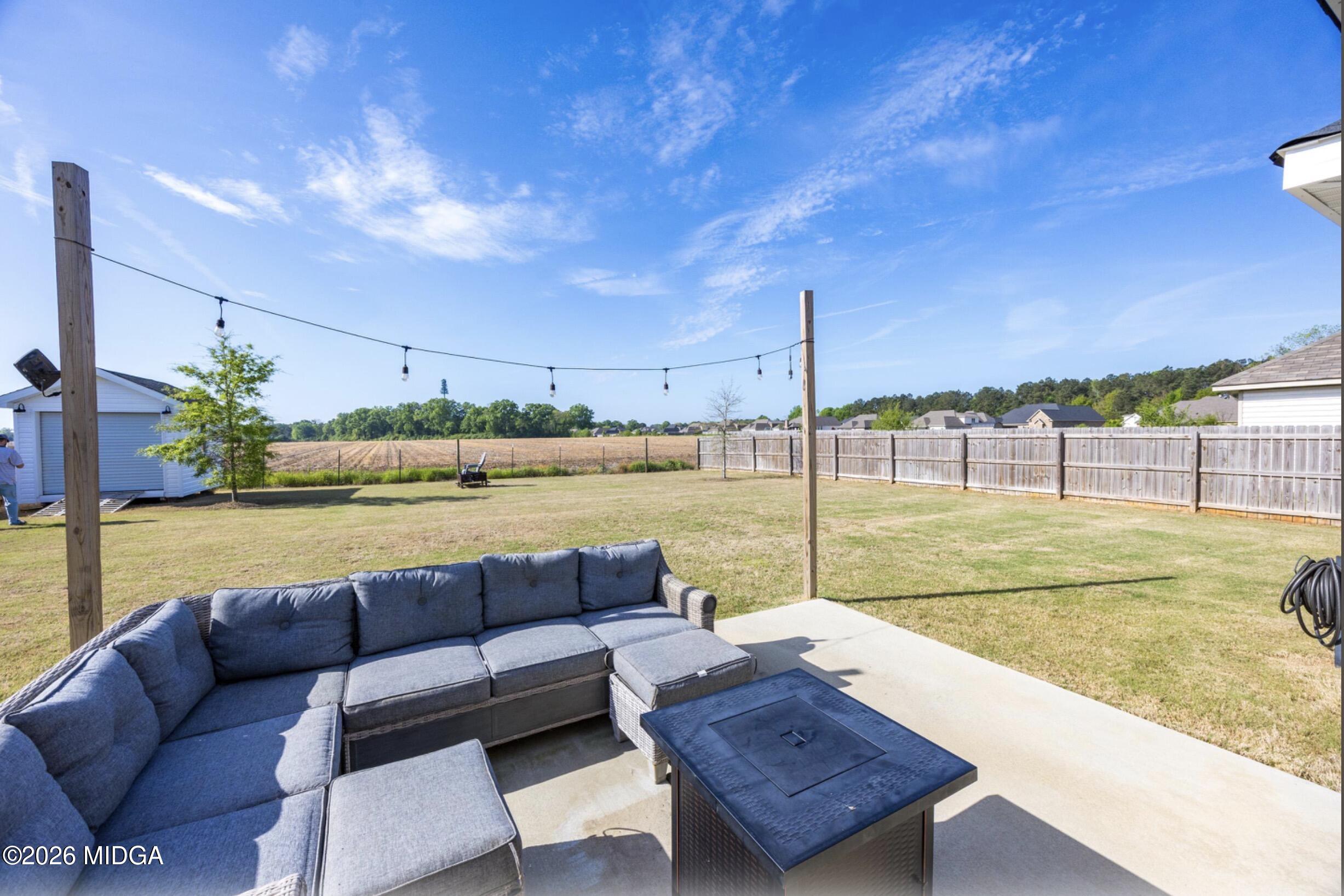610 Daisy Drive Perry, GA 31069 - Photo 27 of 33 a view of a swimming pool with a lounge chairs