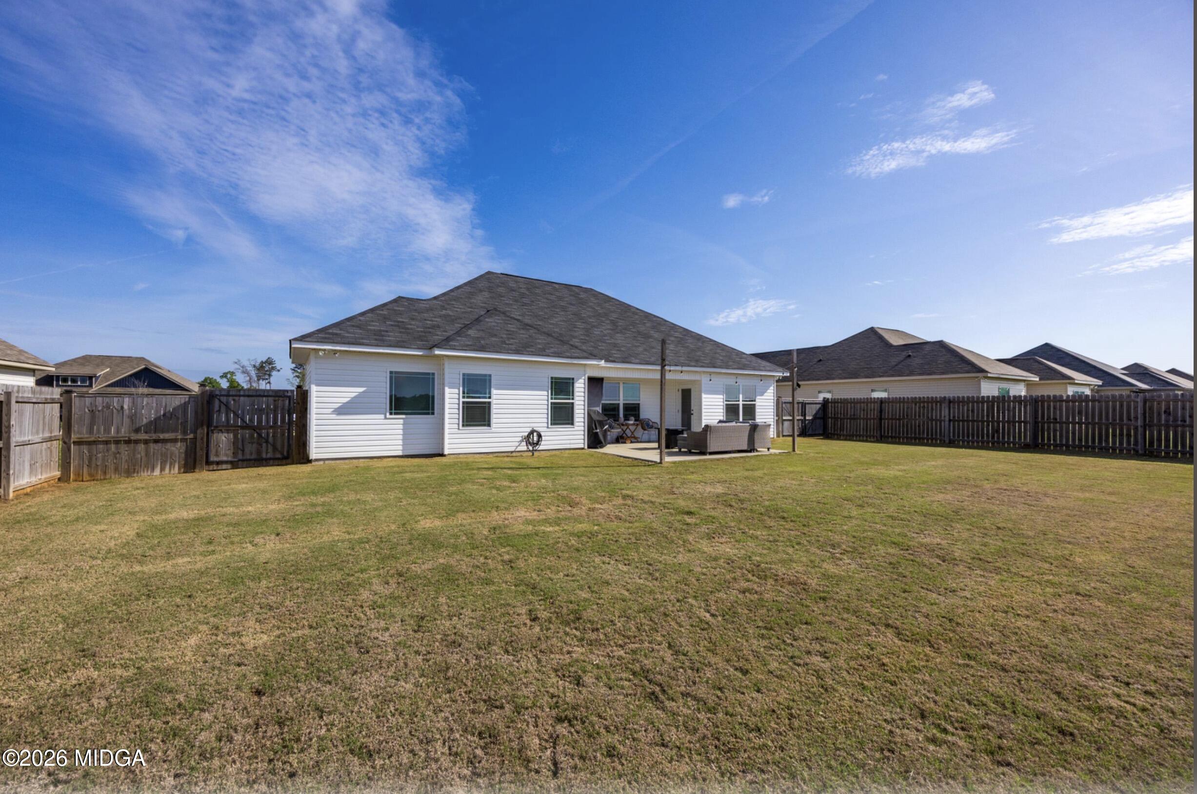 610 Daisy Drive Perry, GA 31069 - Photo 29 of 33 a front view of a house with a garden