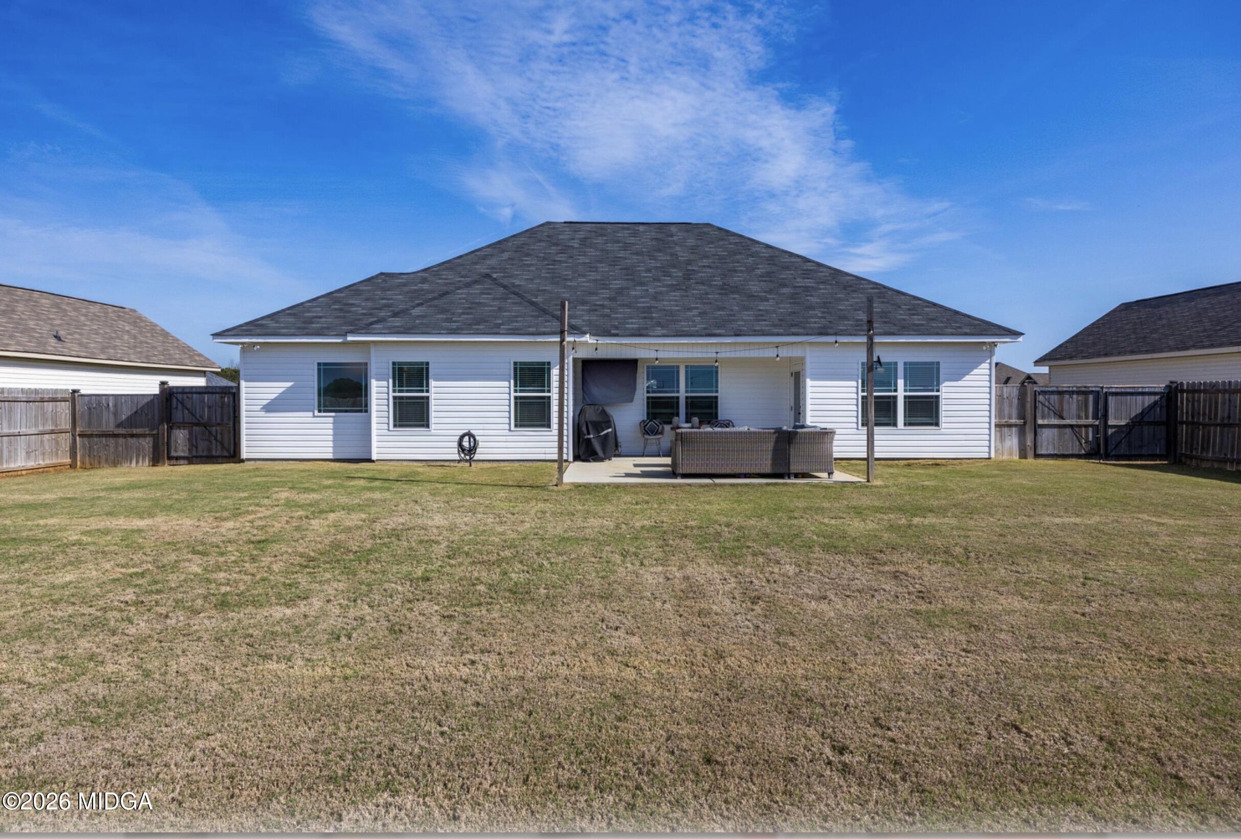 610 Daisy Drive Perry, GA 31069 - Photo 30 of 33 a front view of a house with a garden