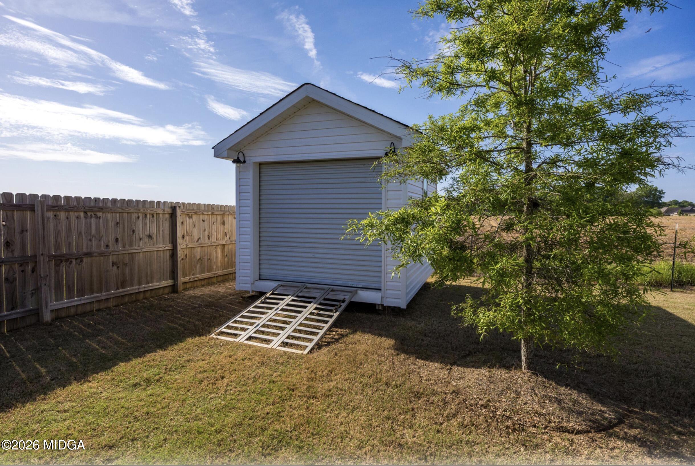 610 Daisy Drive Perry, GA 31069 - Photo 31 of 33 a view of a house with a yard