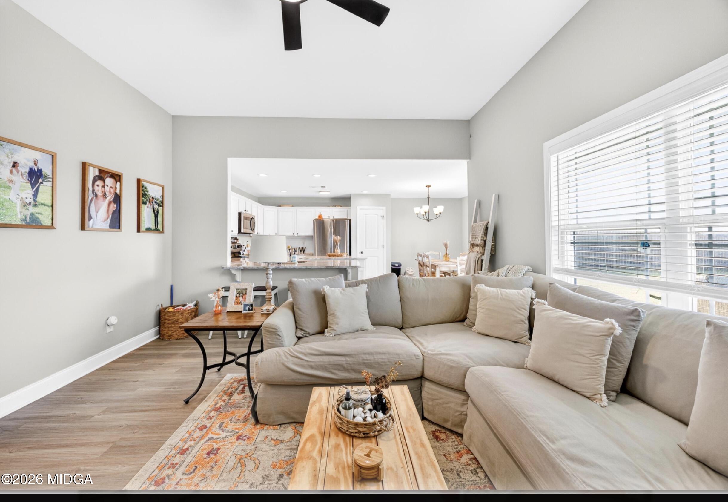 610 Daisy Drive Perry, GA 31069 - Photo 6 of 33 a living room with furniture and a large window