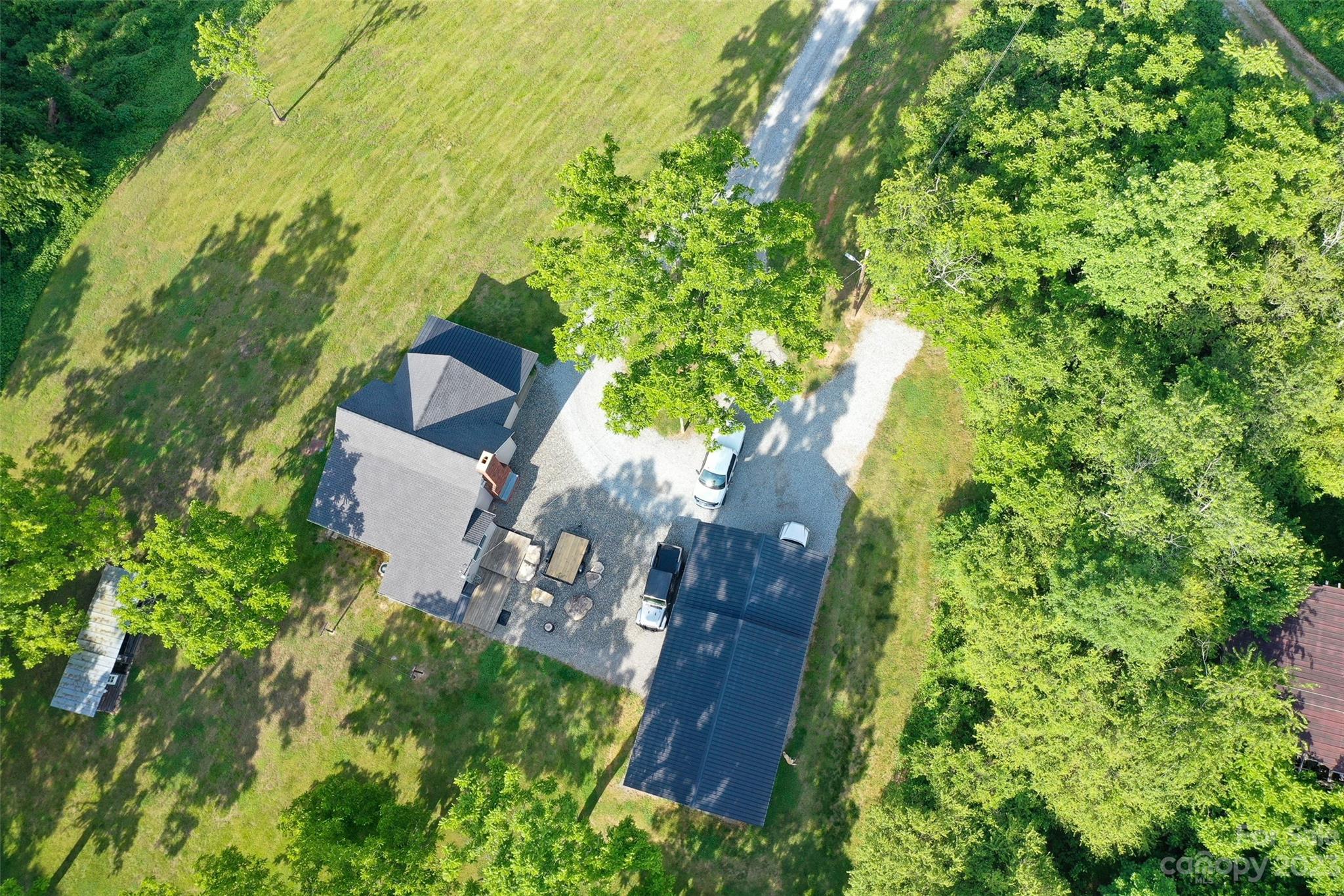 191 Lackey Road Hiddenite, NC 28636 - Photo 36 of 40 an aerial view of a house with a yard