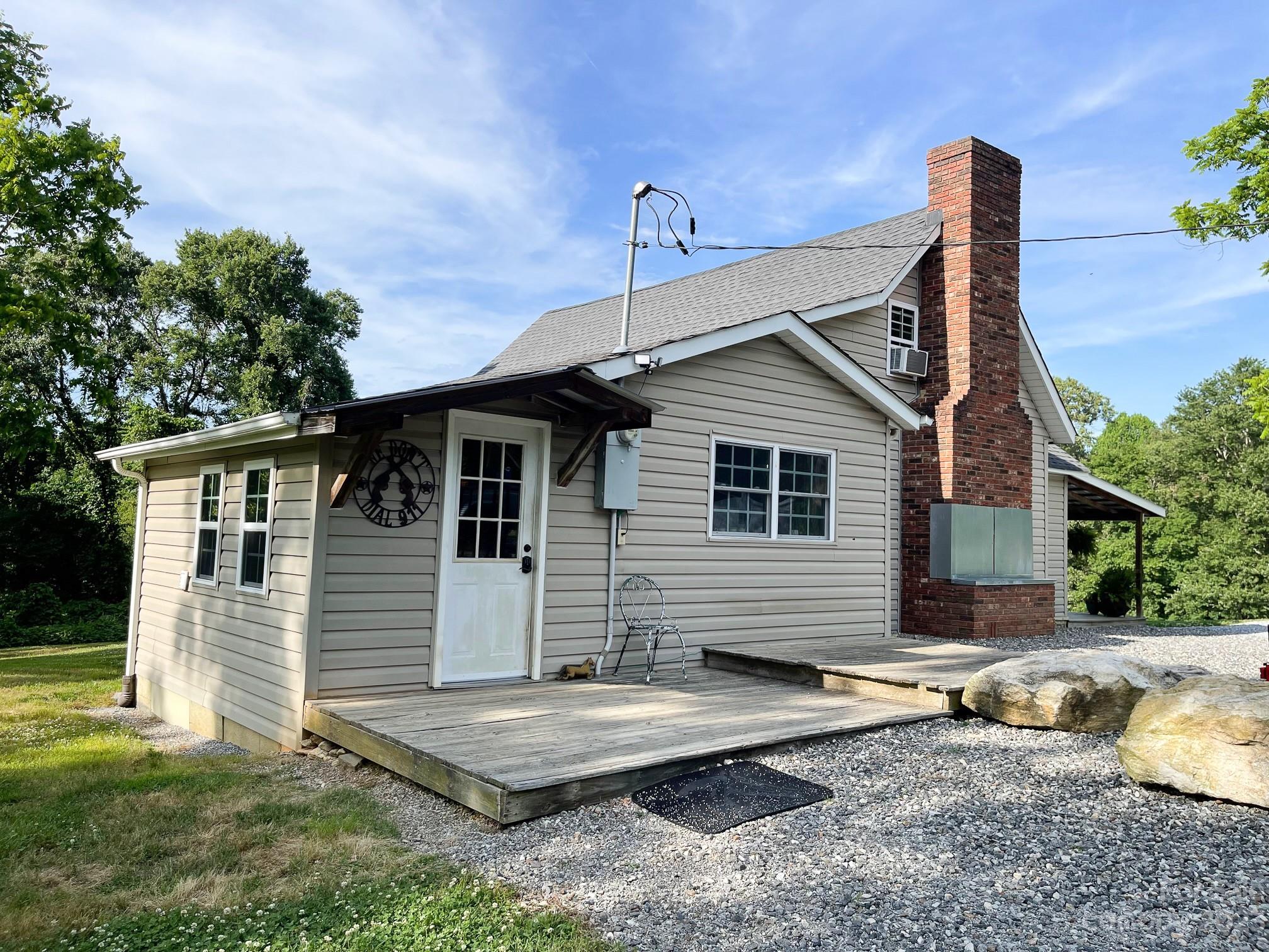 191 Lackey Road Hiddenite, NC 28636 - Photo 5 of 40 a view of a house with a yard