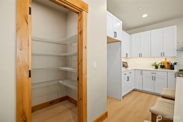 a en suite bathroom with a sink a mirror and a shower