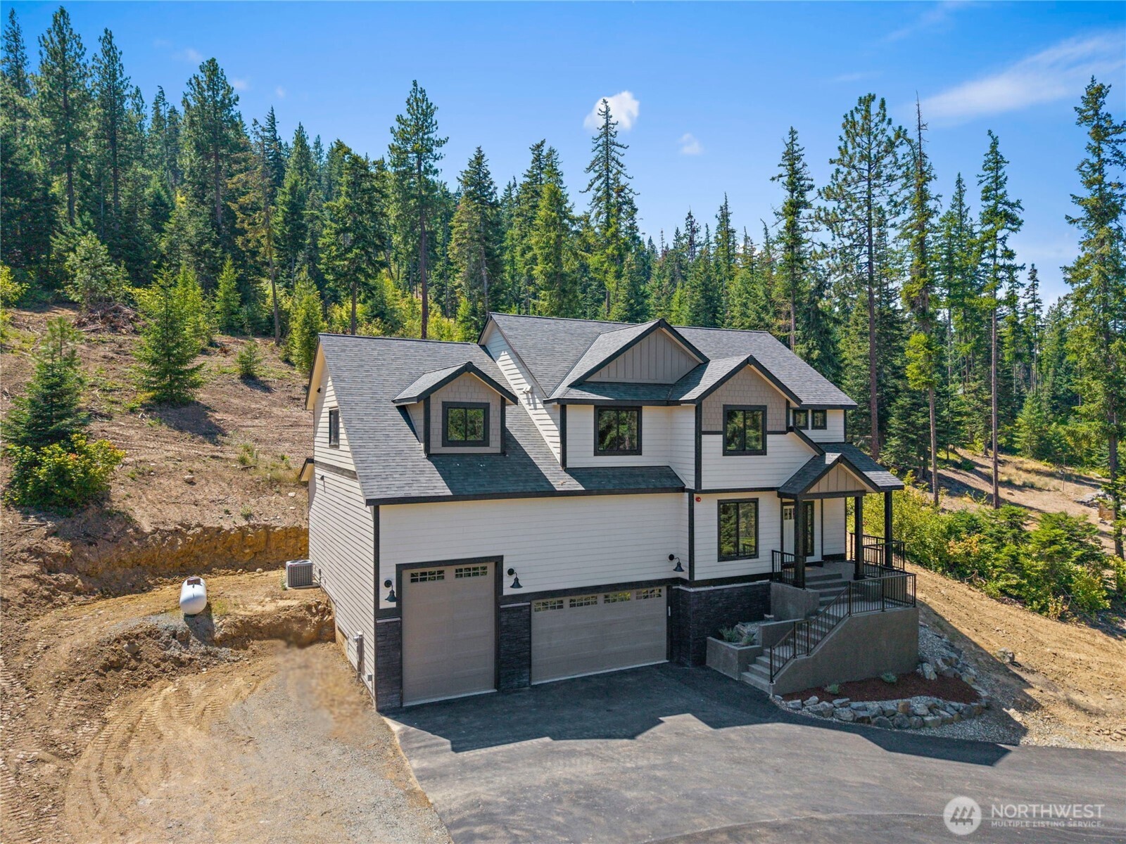 660 Stone Ridge Drive Cle Elum, WA 98922 - Photo 39 of 40 a front view of a house with trees