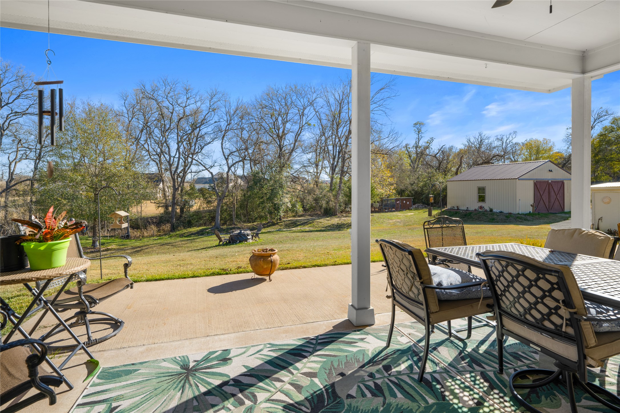 9467 Loop Road Bellville, TX 77418 - Photo 20 of 26 a view of a swimming pool with seating area and furniture