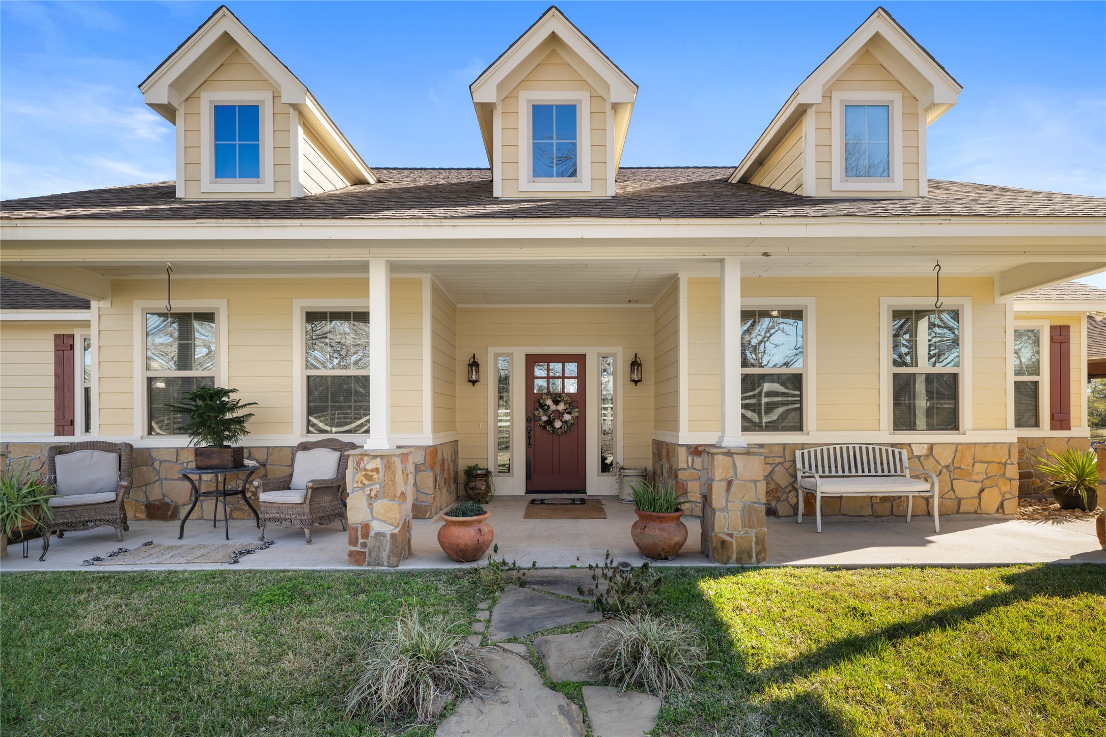 9467 Loop Road Bellville, TX 77418 - Photo 2 of 26 a view of a house with furniture and a yard
