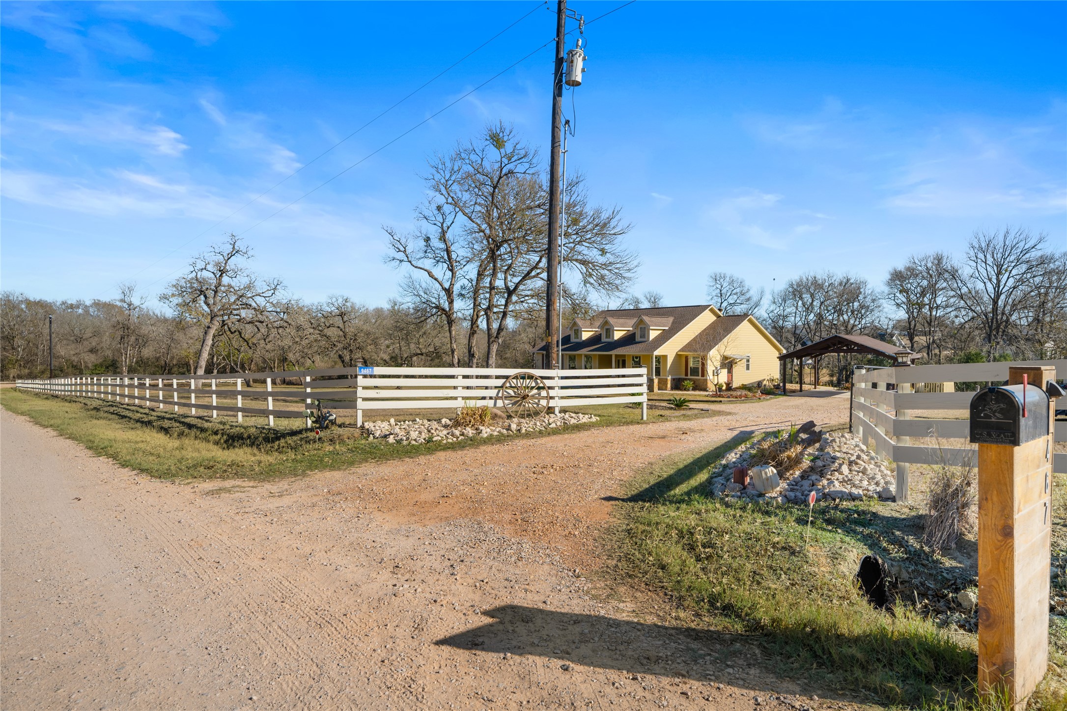 9467 Loop Road Bellville, TX 77418 - Photo 26 of 26 a view of a house with a yard