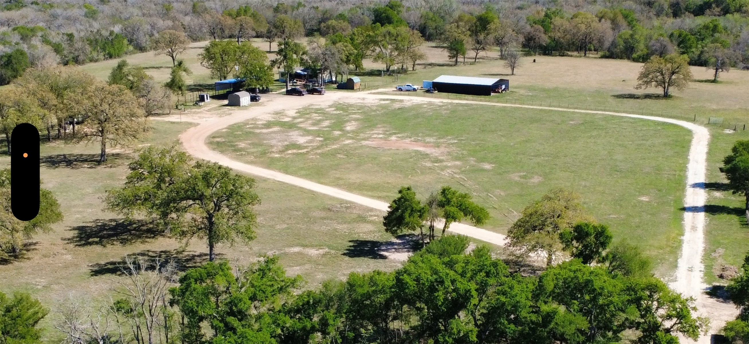 1042 Los Ranchitos Road Cameron, TX 76520 - Photo 32 of 40 an aerial view of a house with yard and lake view