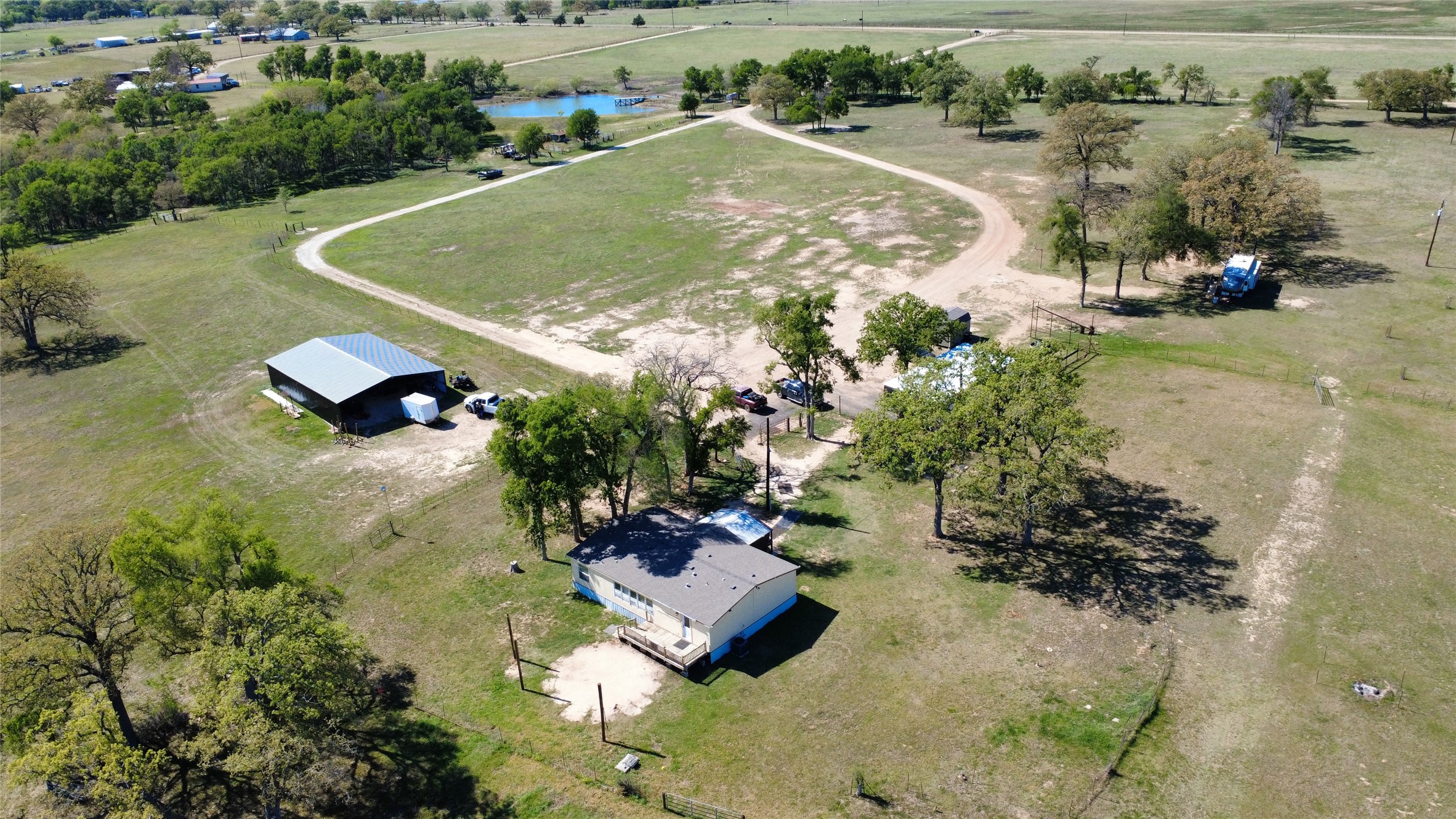 1042 Los Ranchitos Road Cameron, TX 76520 - Photo 38 of 40 an aerial view of a house with a yard