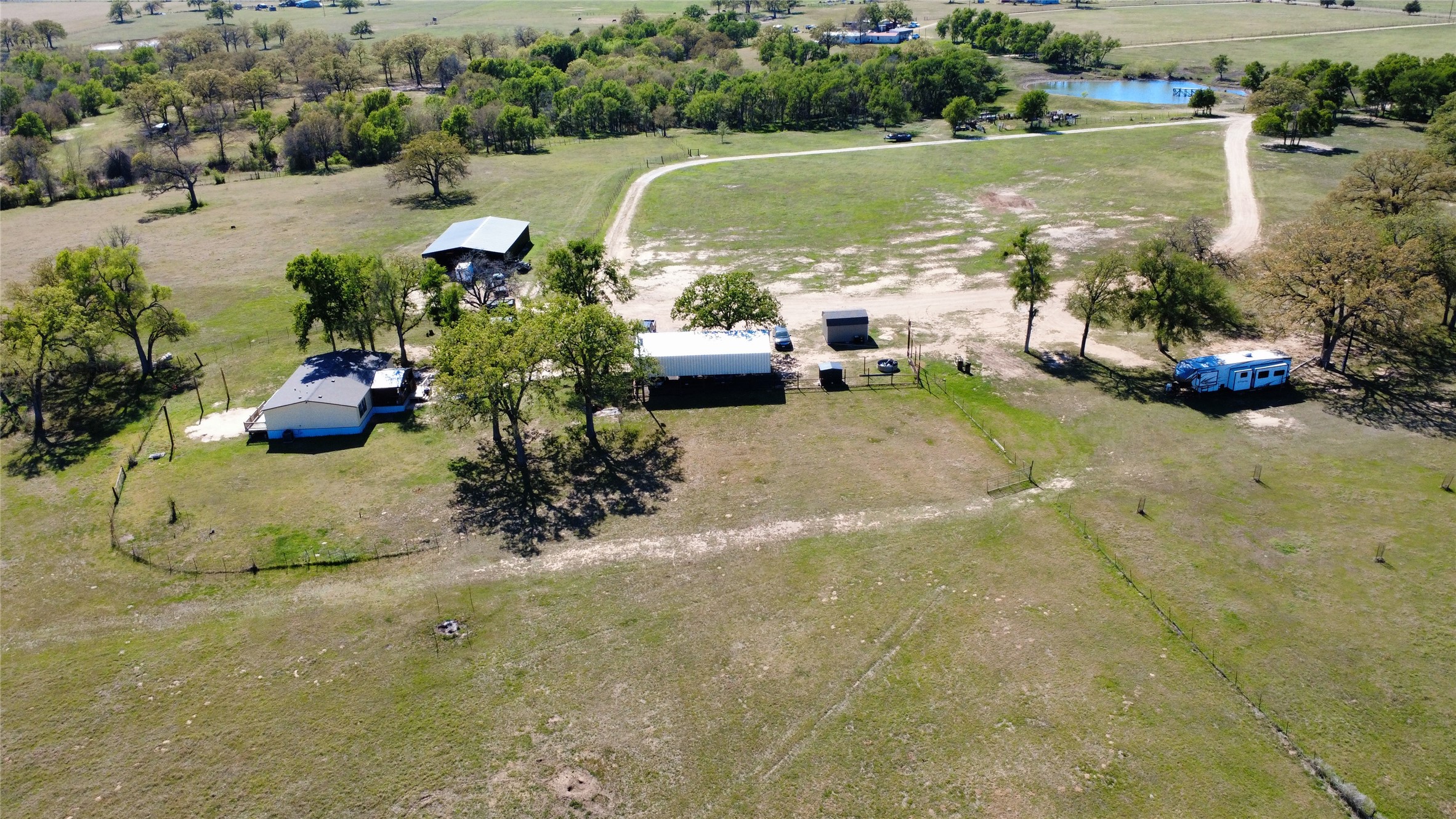 1042 Los Ranchitos Road Cameron, TX 76520 - Photo 39 of 40 a view of a garden with an outdoor space