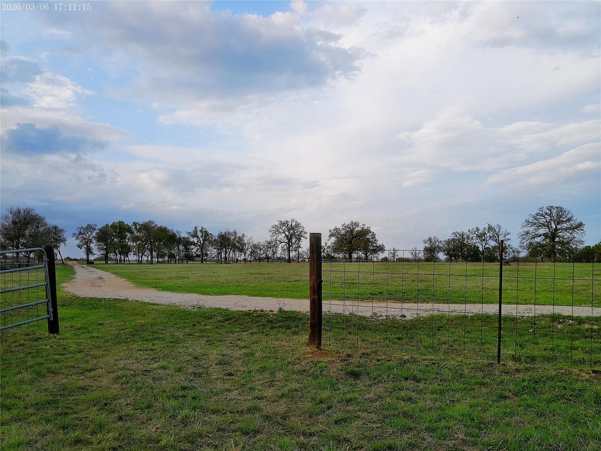 1042 Los Ranchitos Road Cameron, TX 76520 - Photo 5 of 40 a view of a field and trees in the background