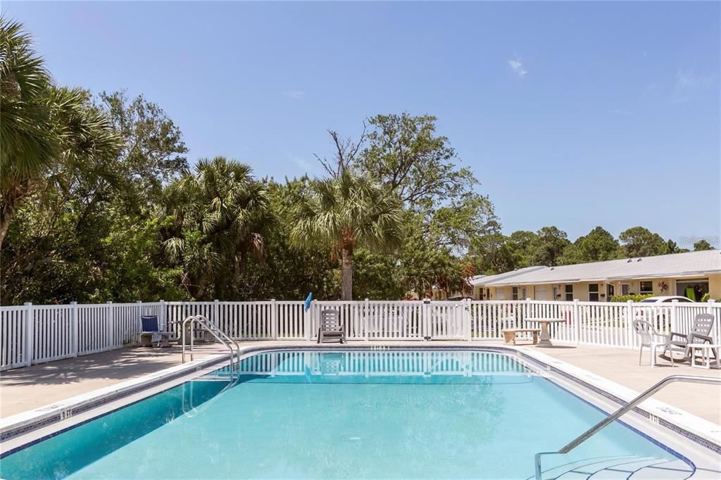 4932 Ilener Street New Port Richey, FL 34652 - Photo 21 of 38 a view of a house with swimming pool
