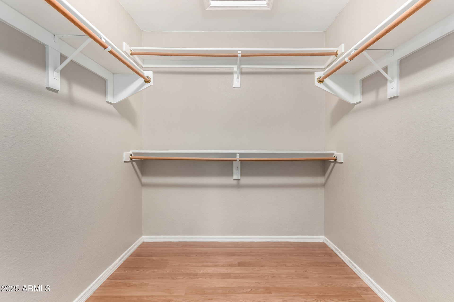 3822 West Fallen Leaf Lane Glendale, AZ 85310 - Photo 19 of 35 a view of an empty walk in closet