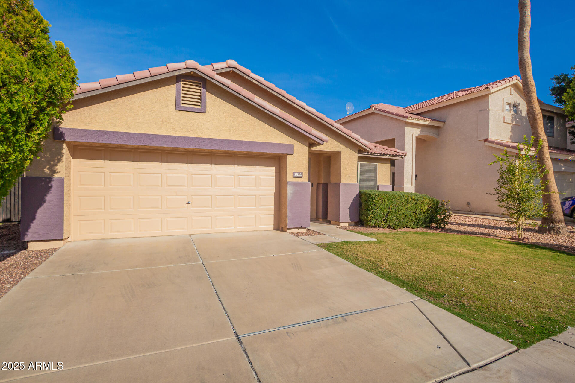 3822 West Fallen Leaf Lane Glendale, AZ 85310 - Photo 2 of 35 a front view of a house with a yard