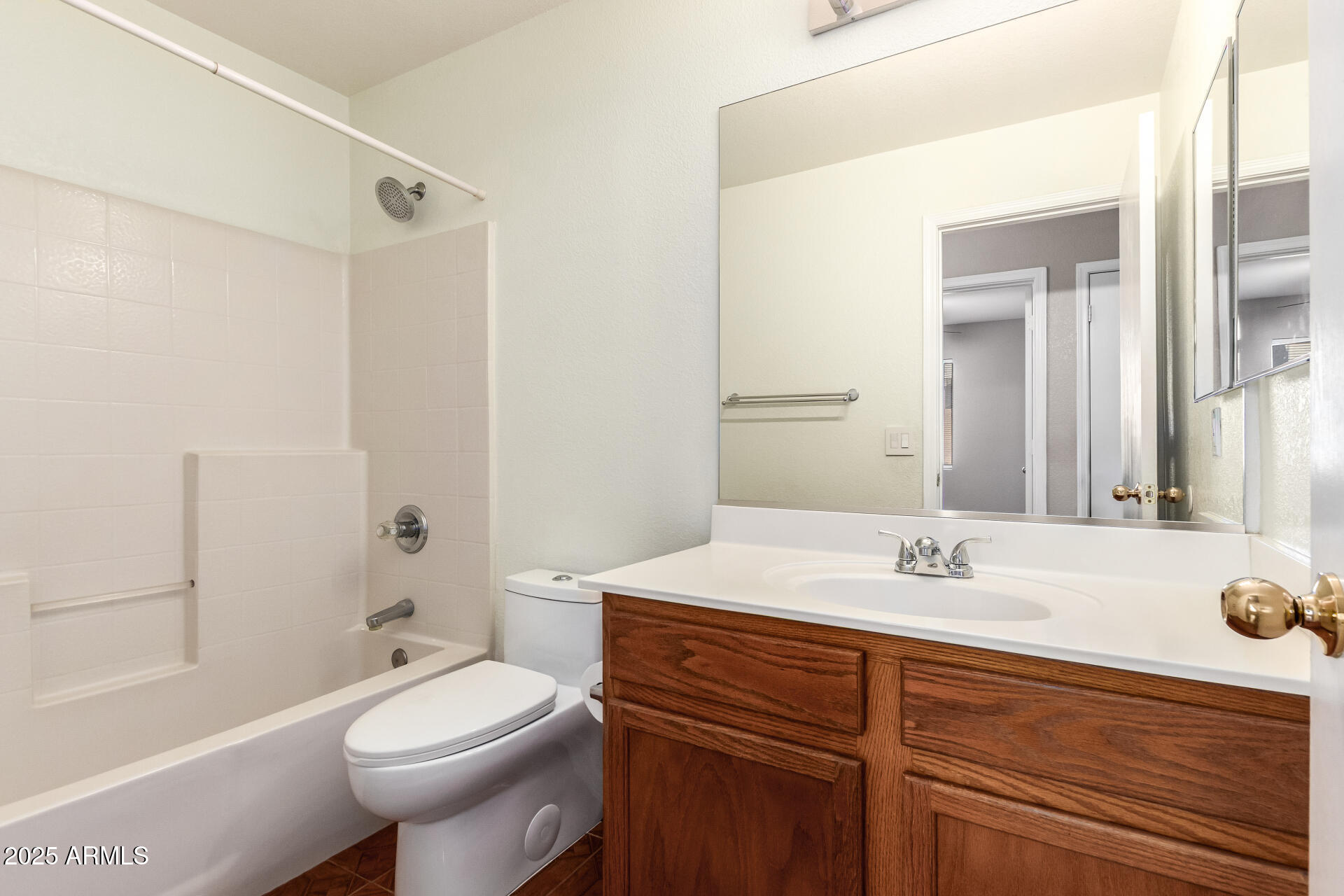 3822 West Fallen Leaf Lane Glendale, AZ 85310 - Photo 24 of 35 a bathroom with a sink toilet vanity and shower