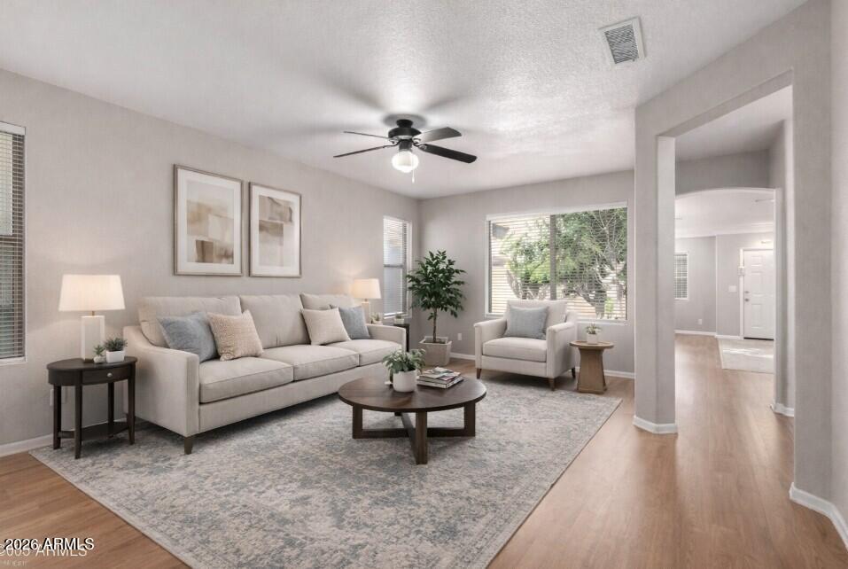 3822 West Fallen Leaf Lane Glendale, AZ 85310 - Photo 33 of 35 a living room with furniture and a large window