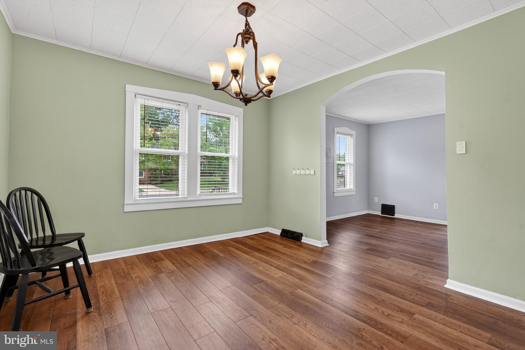 106 Ford Street Voorhees, NJ 08043 - Photo 11 of 36 a view of a livingroom with wooden floor and windows