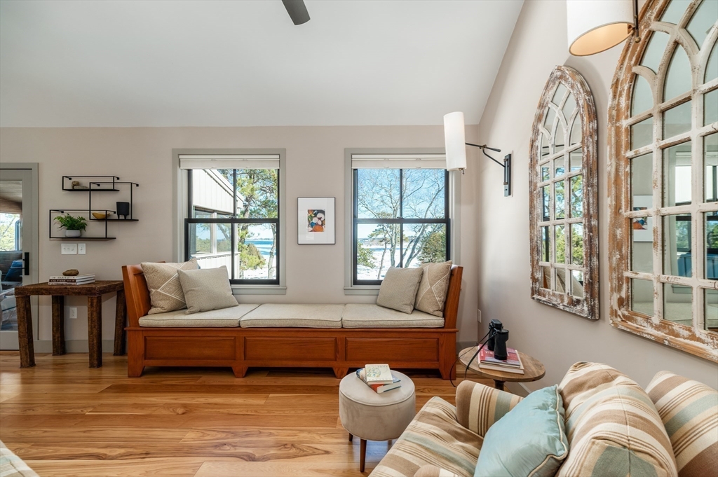 15 Lufkin Point Road Essex, MA 01929 - Photo 15 of 41 a living room with furniture and a large window