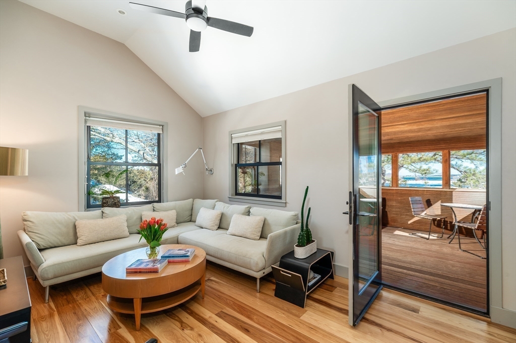 15 Lufkin Point Road Essex, MA 01929 - Photo 16 of 41 a living room with furniture a rug and a window