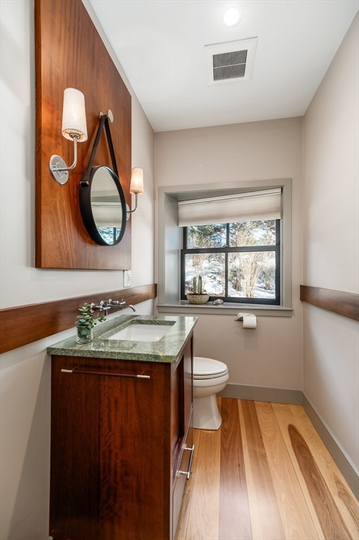 15 Lufkin Point Road Essex, MA 01929 - Photo 28 of 41 a bathroom with a sink and a mirror