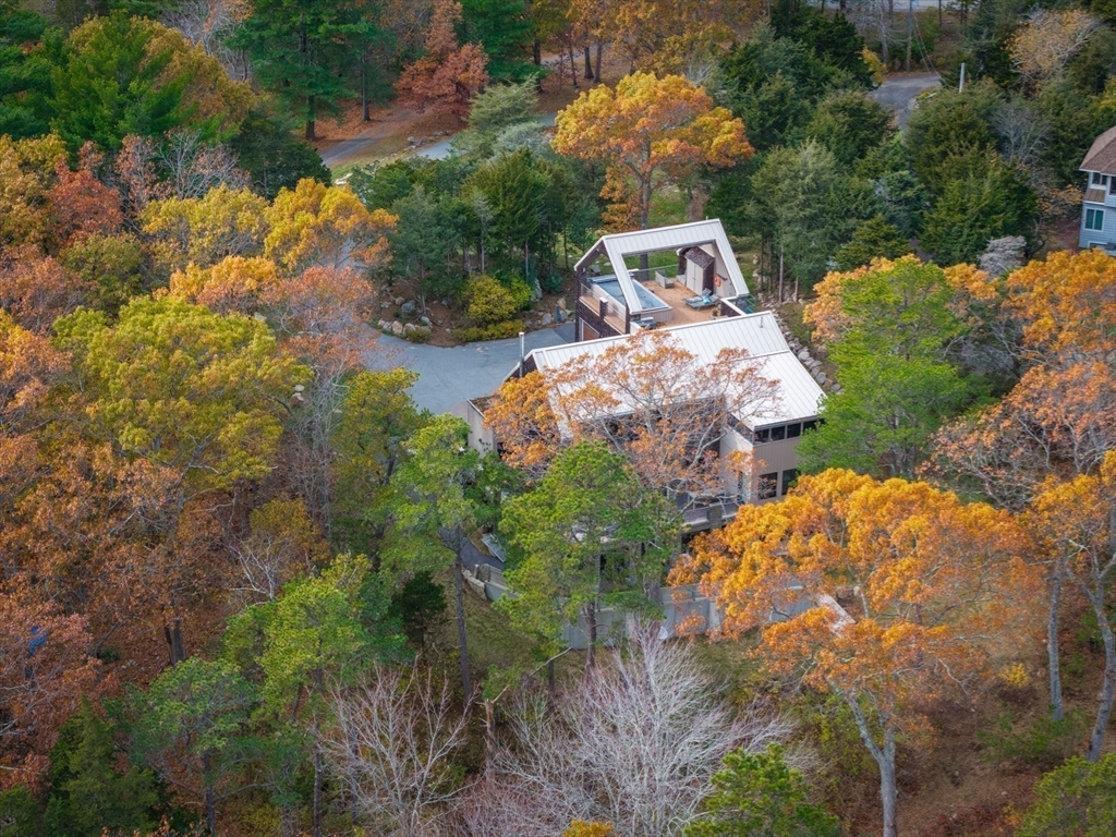 15 Lufkin Point Road Essex, MA 01929 - Photo 32 of 41 an aerial view of a house with yard swimming pool and outdoor seating