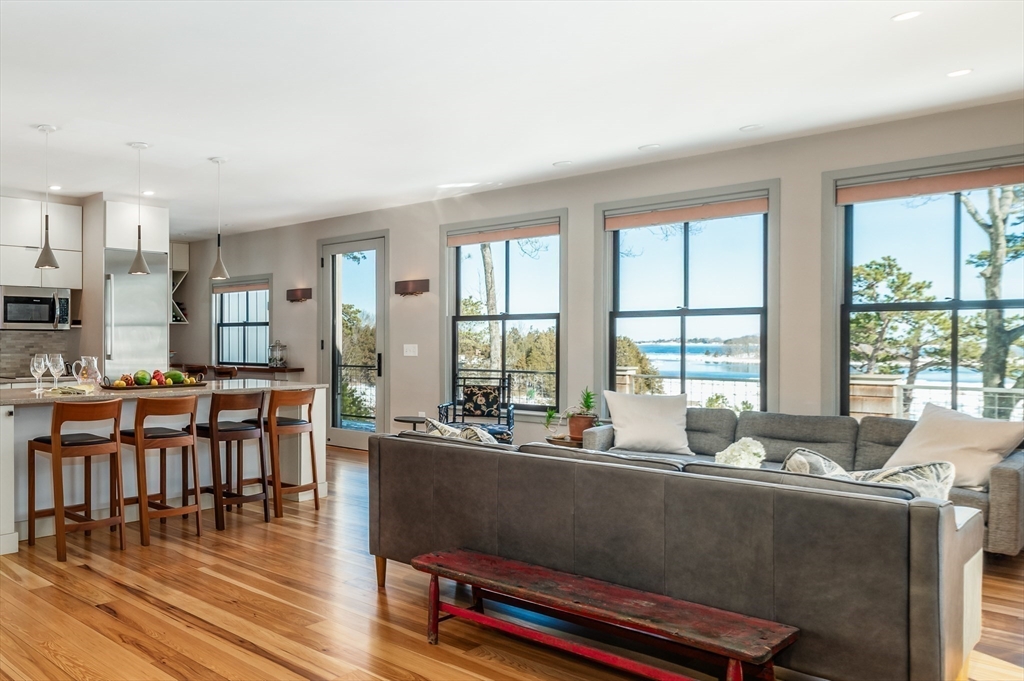 15 Lufkin Point Road Essex, MA 01929 - Photo 5 of 41 a room with lots of furniture and windows