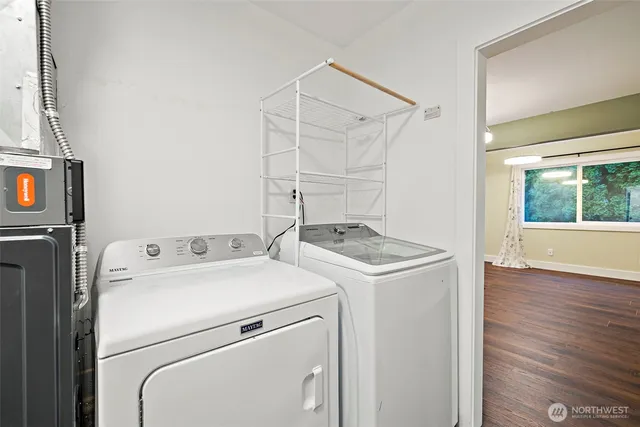 a utility room with dryer and washer