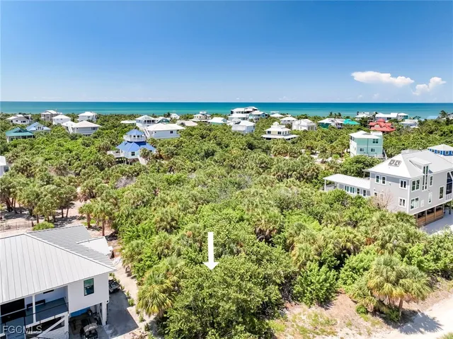 a view of a swimming pool and an outdoor seating