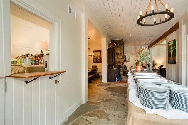 a kitchen with stainless steel appliances and cabinets