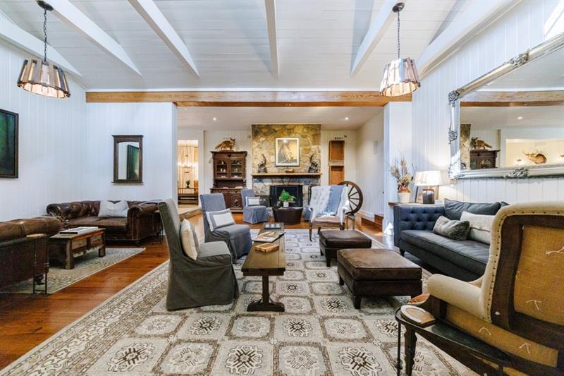 31 Barn Inn Road Lakemont, GA 30552 - Photo 14 of 86 a living room with furniture and a fireplace