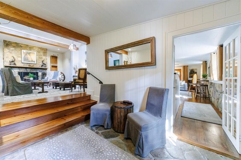 31 Barn Inn Road Lakemont, GA 30552 - Photo 32 of 86 a living room with furniture a dining table and chairs with outer view