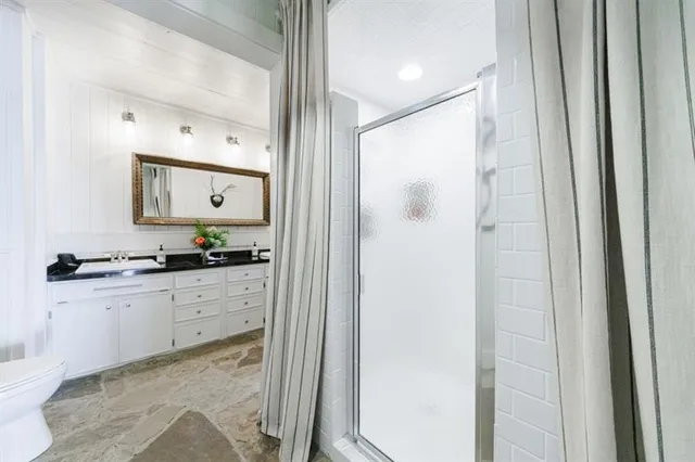 a bathroom with a sink and mirror