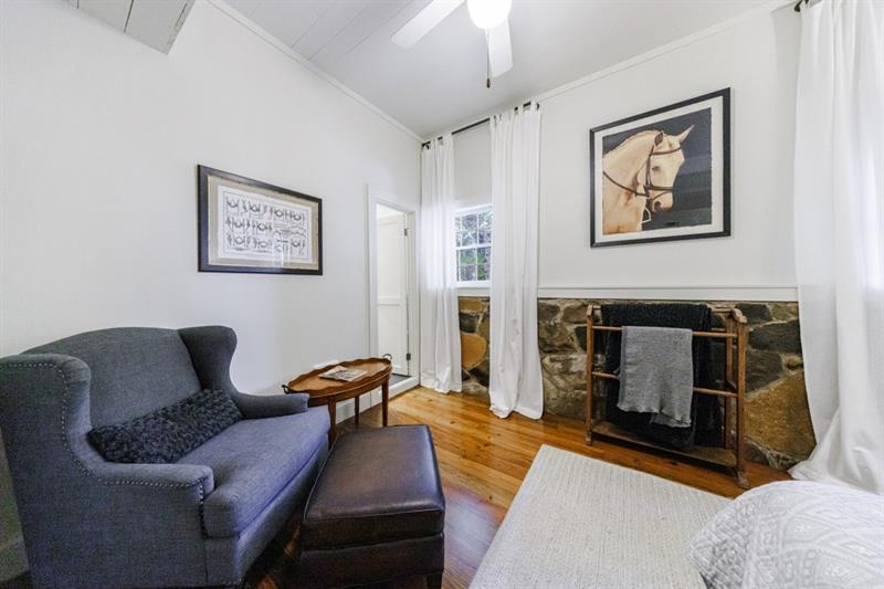 31 Barn Inn Road Lakemont, GA 30552 - Photo 43 of 86 a living room with furniture and a fireplace