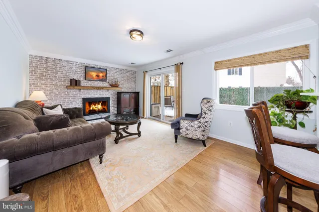 a bedroom with a bed and a table in it