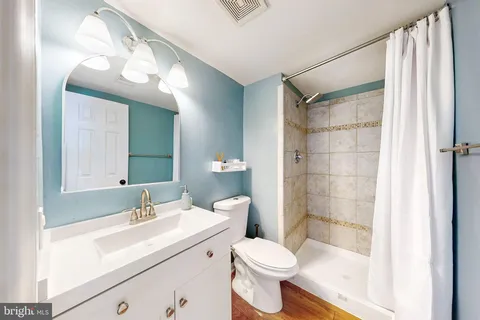 a bedroom with bed and a window