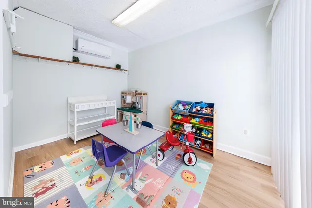 a utility room with sink dryer and washer