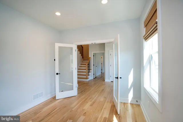 a kitchen with stainless steel appliances a refrigerator sink and microwave