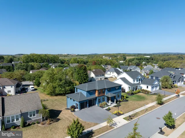 a front view of a house with a porch
