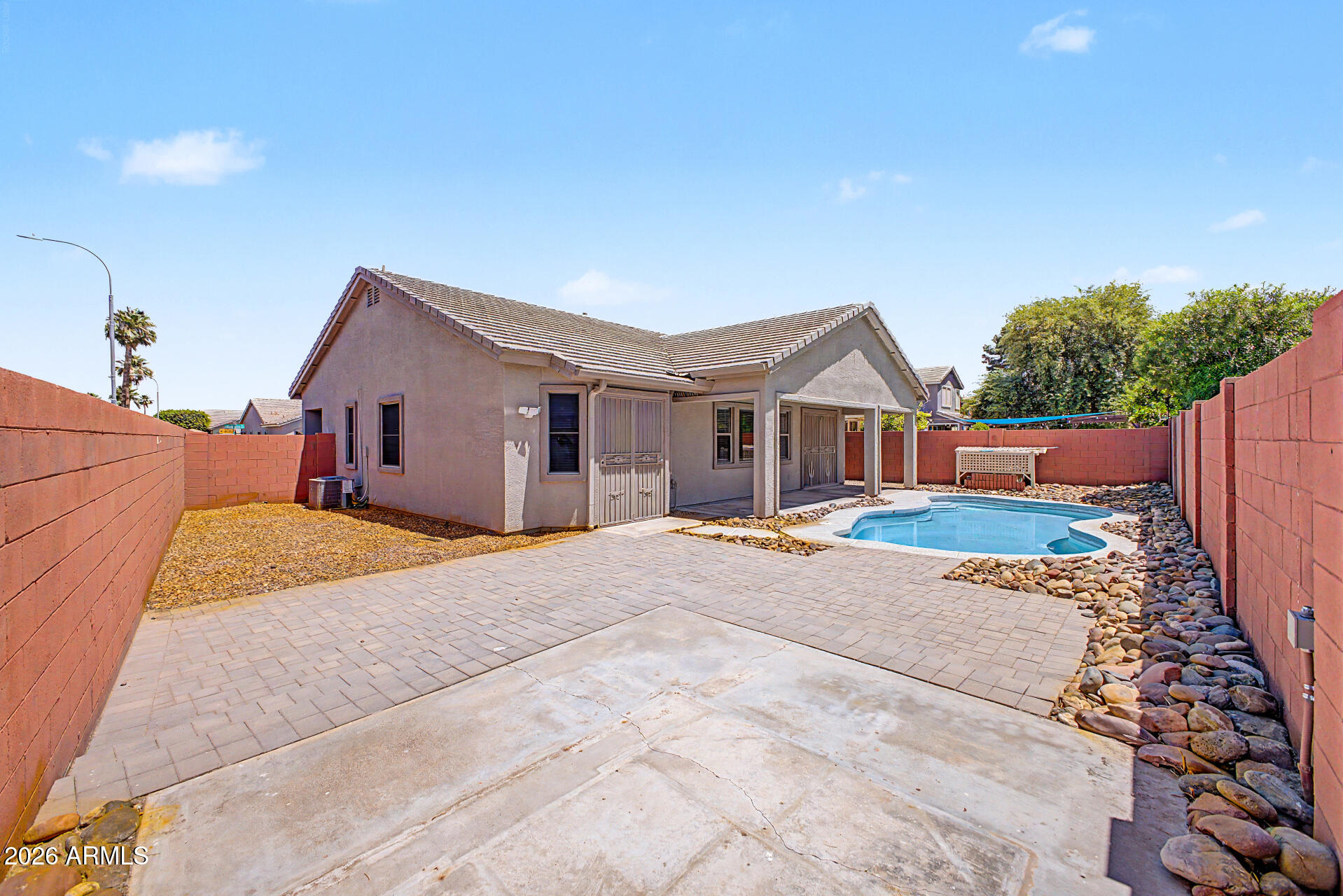 11199 West Monte Vista Road Avondale, AZ 85392 - Photo 33 of 36 a house with yard in front of it